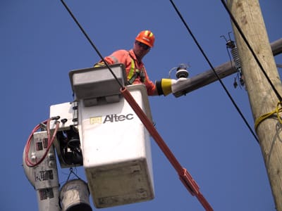 Emergency worker fixing power line